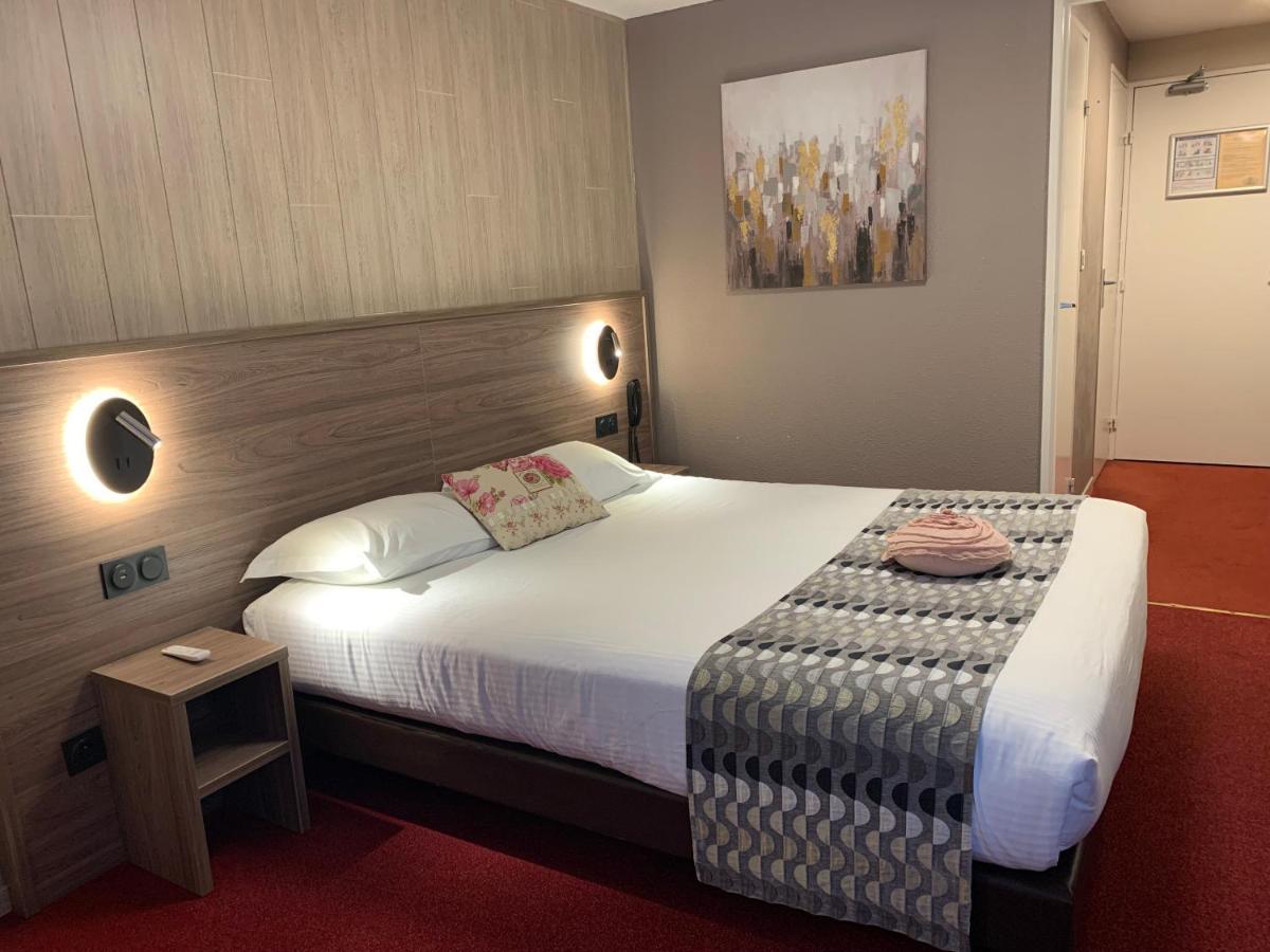 Logis Hotel Le Lac Амбрюн Екстериор снимка